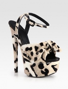 Trend-worthy design of lush calf hair with a daring leopard print and big bow, lifted by an ultra-high heel and platform. Self-covered heel, 6½ (165mm)Covered platform, 2¼ (60mm)Compares to a 4¼ heel (110mm)Leopard print calf hair upperAdjustable ankle strapLeather liningLeather and rubber solePadded insoleMade in Italy