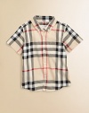 Fashioned in the renowned check design, this breezy cotton button-down features a shirttail hem and patch pocket.Button-down collarShort sleevesButton-frontFront patch pocketShirttail hemCottonMachine washImported Please note: Number of buttons may vary depending on size ordered. 