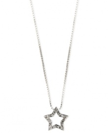 Shine bright in this festive star pendant by Anne Klein. Pave glass accents add allure to this ultra-glam style. Set in silver tone mixed metal. Approximate length: 16 inches + 2-inch extender. Approximate drop: 1/2 inch.