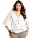 Crochet-knit bell sleeves and a slouchy-chic fit make this American Rag sweater undeniably cool.