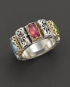 From the Clio collection, a silver and gold ring with baguette-shaped multi-colored stones. Designed by Konstantino.