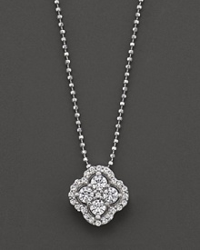 Diamond clover necklace in white gold.