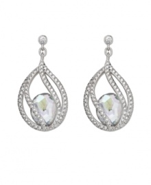 Polish your look with subtle refinement. Crystal Moonlight is encapsulated by intricate strands of clear Swarovski crystal pavé. This exquisite pair of silver tone mixed metal pierced earrings adds glamour to every look. Approximate drop: 1-3/8 inches.