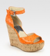 Rustic cork wedge topped with an ostrich-print leather upper and adjustable ankle strap. Cork wedge, 5 (125mm)Cork platform, 1½ (40mm)Compares to a 3½ heel (90mm)Ostrich-print leather upperLeather lining and solePadded insoleImported