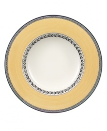 With a quaint floral garland and band of pale yellow in premium porcelain, this Audun rim soup bowl coordinates beautifully with the entire Audun country dinnerware collection from Villeroy & Boch.