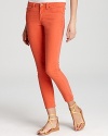 The latest crop to hit the scene, these skinny Vince jeans pop with personality--vibing in a flavorful tomato hue that travels through your schedule with runway-inspired style.