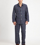 Two-piece set, shaped for hours and hours of comfort, in remarkably soft, breathable cotton. Flannel/brushed cotton. Machine wash. Imported.SHIRTButton frontChest, hip pocketsPANTTwo-button elastic waistInseam, about 31