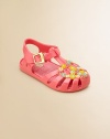 A heart-shaped flower pattern brightens up these adorable, not-so-basic jellies.T-strap and buckle closurePVC upperPVC liningPVC solePadded insoleImported