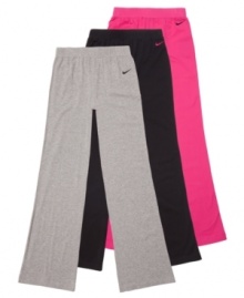 Cozy up. On a cool day she can jump into these soft, snuggly fleece pants from Nike for a boost of comfort.