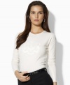 This essential long-sleeved crewneck tee from Lauren by Ralph Lauren rendered in ultra-breathable cotton exudes stunning elegance with a beaded and embroidered Ralph Lauren crest.