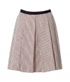 Luxurious pleated skirt in fine cotton and rayon - by Jason Wu, the stars new in designer - his detailed designs even conquered the closets of Firts Lady Michelle Obama and Hollywood darling Jessica Alby - elegant color combination red and beige - fashionable A-line, pleasant knee length - slim waistband - a mix of feminine, stylish and sophisticated - pair with a simple top which is tucked-in - genius for every day at the office