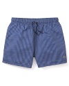 Colorful stripes adorn these handsome swim trunks, perfect for body surfing or just catching some rays by the pool.