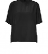 Streamlined in silk with luxe leather and shearling trim, Neil Barretts breezy top is an ultra sophisticated choice - Round neckline, dolman short sleeves, black leather trim, cream shearling trim, pull-over style - Loose fit - Team with flats, a pencil skirt, and an oversized clutch for cocktails