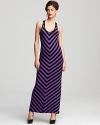 Bold purple and black chevron stripes lend ocular-cool to this Aqua maxi dress for easy-to-wear every day style that never compromises your discriminating taste.