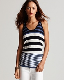 Boasting variegated stripes, this Vince cotton tank is a fresh substitute for the basic tee when your on island time. Wear it with white skinnies and punch up the light look with some bold black and blue.