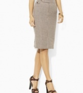 A timeless houndstooth print lends a heritage flourish to Lauren by Ralph Lauren's classic pencil skirt in soft, luxurious linen.