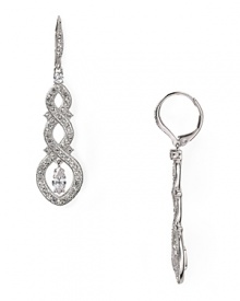 A delicate drop of pave crystals will bring a touch of sparkle to your evening look. Wear these earrings from Lora Paolo for an elegant after-hours statement.