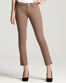 Streamline your silhouette in DL1961's skinny, ankle-length jeans, articulated in a chic neutral hue.