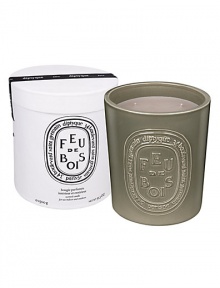 Diptyque teamed up with Virebent, a well-known porcelain manufacturer established in 1924, to make its 'indoor and outdoor' scented candle. It chose earthenware for its rustic touch and hand-crafted look, and because it embodies and brings to life the brand's emblematic oval. This four-wick Diptyque candle is made exclusively by hand and recalls the warm, familiar, sophisticated accord of rare woods throughout the long winter days. Burn time is approximately 150 hours.