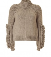 Recently relaunched with a fashion-forward aesthetic, this ultra-luxe pullover from Belstaff brings trend-right flair to knitwear - Ribbed turtleneck, decorative stitching at shoulders, fringe detailing on sleeves, ribbed cuffs and hem, cropped slim silhouette - Pair with high-waisted trousers, peep-toe heels, and a statement satchel