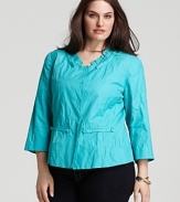 A ruffled neckline lends feminine flair to Tahari Woman's vibrant cotton jacket.