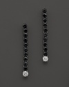 Faceted diamonds and black sapphires sets in 18K. white gold by Roberto Coin.