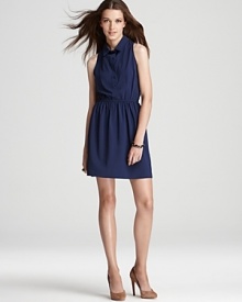 This Aqua shirt dress lends a sleek look in a sleeveless, cinched-waist silhouette. Team with tall sandals and go-to jewelry for a perfectly accessorized look.