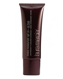 Laura Mercier Tinted Moisturizer - Oil Free is a sheer, lightweight foundation with SPF 20 sun protection for sensitive or acne prone skin. The hydrating, oil-free formula softens skin offering a healthy glow, while preventing excess oil from setting on the surface of the skin. Buildable to hide those hard to cover areas, Tinted Moisturizer - Oil Free is extremely long-wearing, stays colour-true and wears evenly even in humid climates. Mix with your favorite Laura Mercier Foundation to add SPF protection.