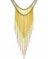 Try tassels for a fresh, spring look. Bar III's extraordinary multi-chain statement necklace is a must for attracting attention. Crafted in antique gold, matte yellow and matte orange tone mixed metal. Approximate length: 15-1/4 inches and 20 inches + 1-1/2-inch extender. Approximate drop: 14 inches.