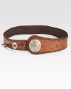 Weathered leather blends rugged style with feminine florals for a bohemian look.2½ wide Loop closure Leather Imported Additional Information Women's Belts Size Guide 