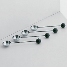 This sugar spoon set by Michael Graves is composed of four teaspoons in polished steel with sphere-shaped knob in black. Makes a great hostess gift too!