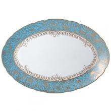 Inspired by the flamboyant designs of the 19th century, Eden Turquoise is both refined and sophisticated. This Limoges porcelain dinnerware service is a remarkable reproduction that captures the beauty of engraved gold work. Made in Limoges, France.