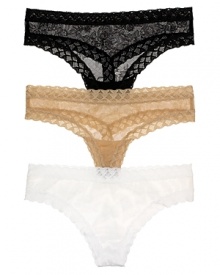 Keep panty lines under wraps with Natori's beautiful floral lace thong in a low-rise silhouette. Style #750042.