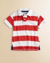 An instant classic, this striped cotton polo shirt will be go-to essential until he outgrows it.Polo collarShort puffed sleevesButton frontUneven side-vented hemCottonMachine washImported Please note: Number of buttons may vary depending on size ordered. 