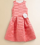 She'll be the belle of the ball in this vivid, pleated frock with rosette detail and plenty of charm.JewelneckSleevelessBack zipperPleated, full skirtPolyesterDry cleanMade in the USA