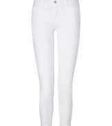 These pristine white capri jeans from J Brand are the perfect foundation for warm weather looks - Classic five-pocket styling, skinny leg, mid-rise - Form-fitting, capri length - Pair with contemporary printed tops and bright leather accessories