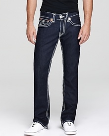 A dark wash jean with severe contrast stitching sets your look apart. From True Religion.