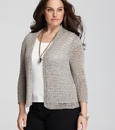 An airy knit provides substantial warmth on this Eileen Fisher cardigan, rendered in an open tape knit for textural appeal.