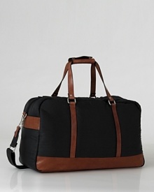 Ecoalf's leather-trimmed overnight bag brings crisp lines and modern design to your weekend away.