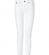 With a flattering fit and bright white stretch denim, Burberry Brits skinny jeans lend a crisp modern polish to every look - Classic five-pocket style with logo charm at hip, button closure, belt loops - Form-fitting - Wear with a brightly hued top and flats