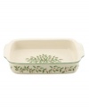 Bake it merry. With a holly motif to match the beloved Holiday dinnerware from Lenox, this large baker is ideal for serving Christmas lasagna, fish and more.