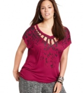 Pounce on an ultra-hot look with Seven7 Jeans' short sleeve plus size top, featuring risqué cutouts!