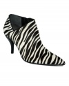 Animal-print pumps are all the rage this season. Dare to step it up a notch? Try these zebra-print Gloriely shooties by GUESS!