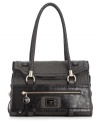 An uptown silhouette with downtown detailing, this satchel by GUESS is ideal for a true city girl. A cotton exterior is detailed with shiny leatherette for a sophisticated yet edgy vibe too chic to resist.