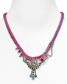 A bold take on this season's homespun trend, this woven fluoro necklace from Juicy Couture hints at your bright side.