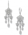 Stand out at your next special occasion. Eliot Danori steps up the elegance factor with these dazzling Plumeria chandelier earrings. Crafted in silver tone mixed metal with an assortment of sparkling crystals. Approximate drop: 1-1/2 inches.