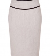 Elegant pencil skirt in fine, ecru cotton and linen blend - Particularly comfortable, thanks to a touch of stretch - Classic slim, curve-hugging silhouette - Hits just above the knee - Chic leather trim snakes the waist and hips - Contrast zip extends from small of the back to hem - Polished and versatile, a must for work, dressy luncheons and cocktails - Pair with a silk button down blouse, cropped leather jacket and pumps