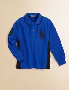 A long-sleeved cotton mesh polo, crafted in a classic fit, is detailed with an embroidered Big Pony, contrast stripes at the side and a twill 3 for an athletic look.Ribbed polo collarLong sleevesButton-frontUneven vented hemCottonMachine washImported Please note: Number of buttons may vary depending on size ordered. 