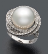 Revel in the sweet glamour of the 1950s. This breathtaking ring features a vintage-inspired design highlighting a cultured South Sea pearl (13-1/2 mm) in 14k white gold surrounded by layers of sparkling round-cut diamonds (1 ct. t.w.).