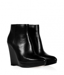 A sleek urbane staple guaranteed to give your look a kick of cool, these Kors Michael Kors leather booties are a chic choice no matter how you pair them - Softly pointed toe, inside zip, stacked leather platform sole unit - Ankle height - Wear with opaque tights and knit dresses or edgy leather leggings and chunky oversized pullovers